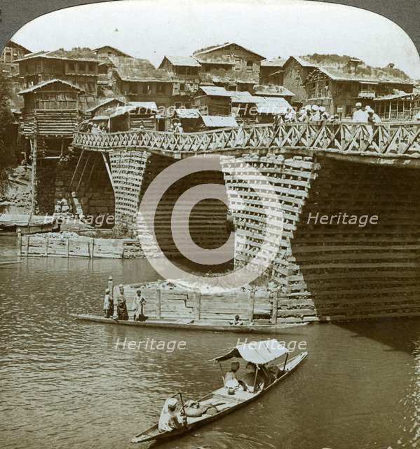 Quaint bridge and houses, City of Sun, Kashmir, India, c1900s(?).Artist: Underwood & Underwood