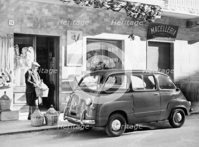Fiat 600 Multipla outside a shop, (c1955-c1965?). Artist: Unknown