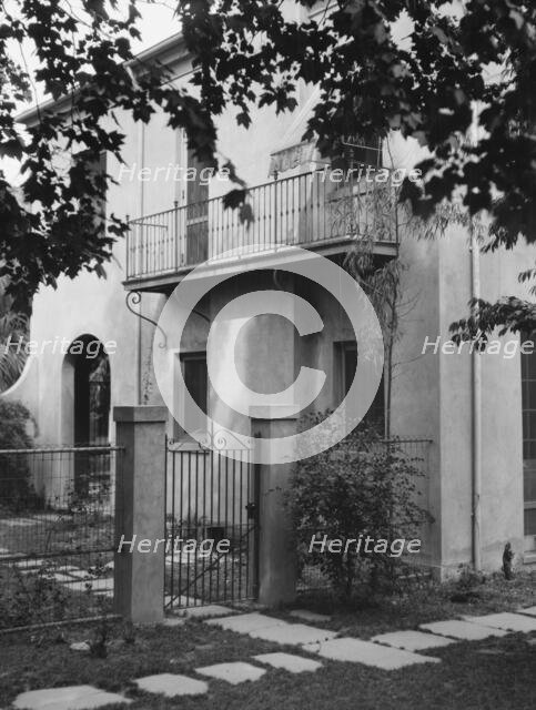 Two-story house, New Orleans or Charleston, South Carolina, between 1920 and 1926. Creator: Arnold Genthe.