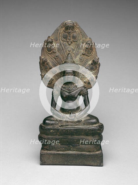 Buddha Enthroned on a Serpent (Naga), Angkor period, early 13th century. Creator: Unknown.