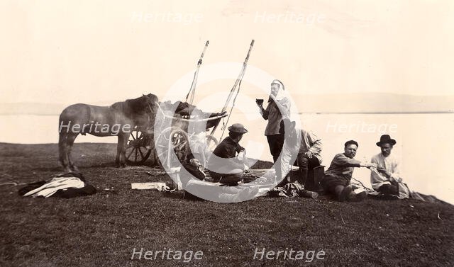 Picnic. Group of Men on the River Shore, 1900. Creators: I. A. Podgorbunskii, V. I. Podgorbunskii.