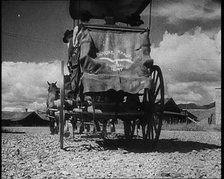 Coach and Horses Waiting To Pick up Passengers Arriving Off the Train, 1932. Creator: British Pathe Ltd.