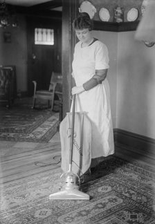 Dunlap vacuuming, between c1915 and c1920. Creator: Bain News Service.