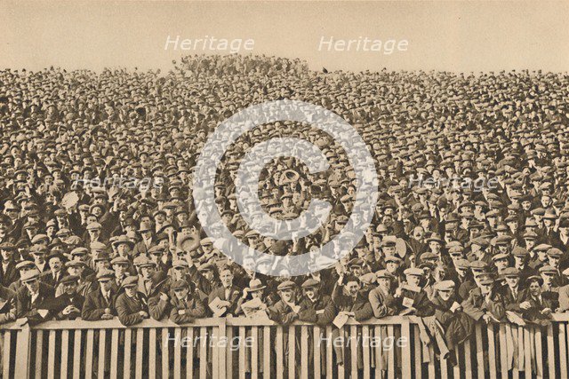 'The Many-Headed Voice Which Roars Behind The Touch-Line Every Winter Saturday', c1935. Creator: Unknown.