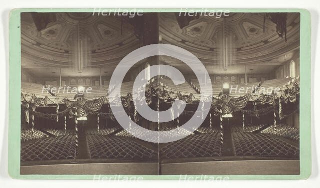 Untitled [auditorium decorated with US flags], late 19th century. Creator: Wright & Hartwell.