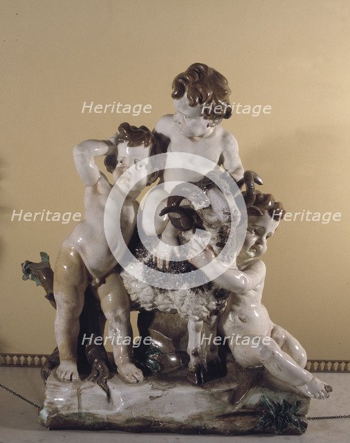 Three children with a goat, porcelain from the Buen Retiro.