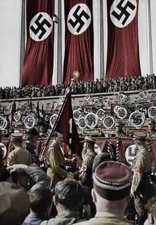 Adolf Hitler dedicates new standards, Nuremberg Rally, Germany, 1934.  Artist: Unknown.