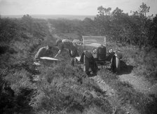 Kitty Brunell road testing a Riley 9 WD tourer, c1930. Artist: Bill Brunell.