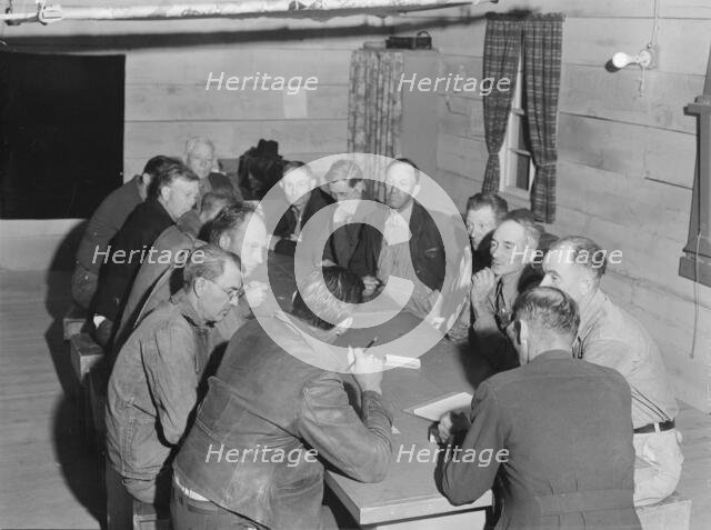Meeting of the camp council, FSA camp, Farmersville, California, 1939. Creator: Dorothea Lange.