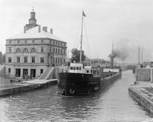 Freighter in Poe Lock, looking down, Sault Ste. Marie, Mich., between 1903 and 1910. Creator: Unknown.