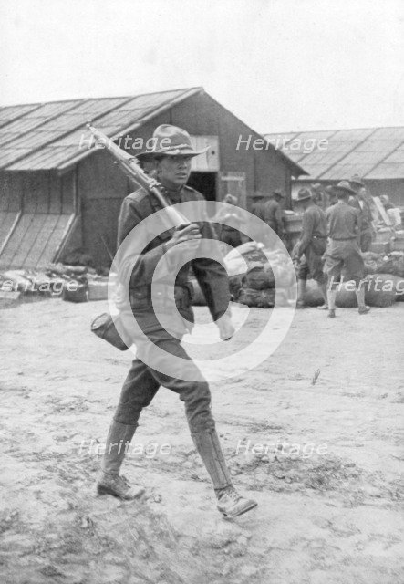 An American soldier on sentry duty, Saint Nazaire, France, c1917. Artist: Unknown