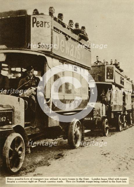 London buses taking Scottish troops to the front, First World War, 1914, (1935). Creator: Unknown.