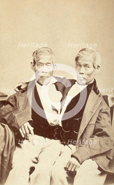 Chang and Eng, conjoined twins, seated, c1860. Creator: Unknown.