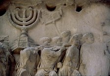 Basrelief in the Arch of Titus representing men carrying a menorah, located in the Via Sacra of t…