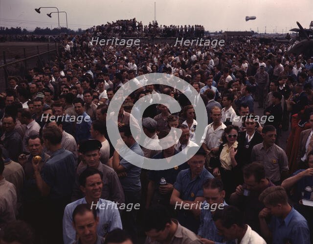 Workers on the Liberator Bombers, Consolidated Aircraft Corp., Fort Worth, Texas, 1942. Creator: Howard Hollem.