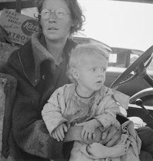 Mother and baby of family on the road, Tulelake, Siskiyou County, California, 1939. Creator: Dorothea Lange.