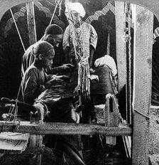Shawl weavers, Kashmir, India, c1900s(?).Artist: Underwood & Underwood