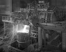 Pouring molten iron, Park Gate steelworks, Rotherham, South Yorkshire, 1964. Artist: Michael Walters