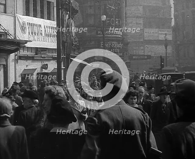 A Soldier from the USA or  Commonwealth Walking Through London, 1943. Creator: British Pathe Ltd.