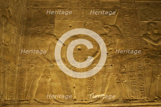 Relief of the Pharaoh making offerings to Horus, Temple of Edfu, Egypt, Ptolemaic period,(2003). Creator: LTL.