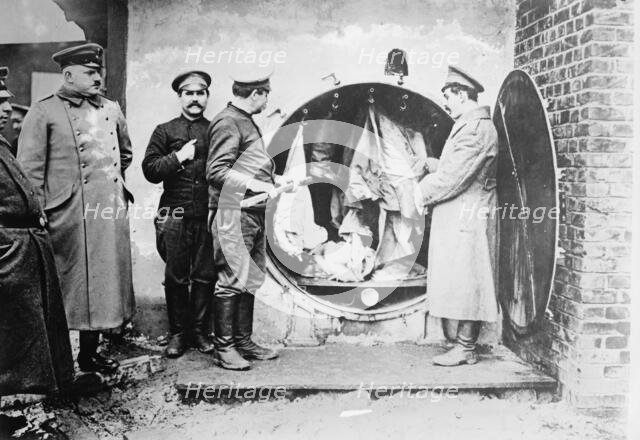 Disinfecting clothing of Russian prisoners, between 1914 and c1915. Creator: Bain News Service.