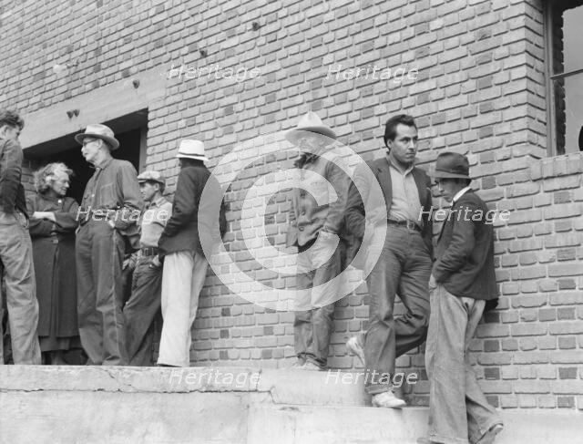 Mexicans, field laborers, on strike in cotton picking season, Bakersfield, California, 1938. Creator: Dorothea Lange.