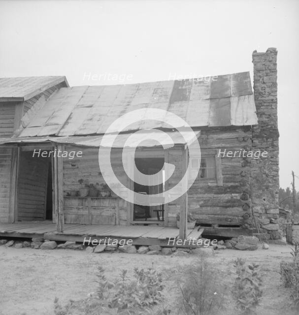 Negro sharecropper house on dirt, near Olive Hill, North Carolina, 1939. Creator: Dorothea Lange.
