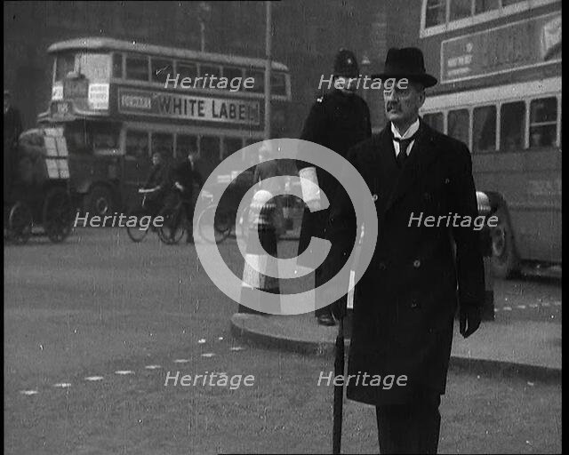Neville Chamberlain, British Politician, Walking Across a London Street, 1937. Creator: British Pathe Ltd.