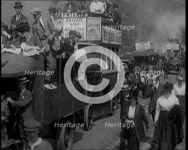 Cars, Buses and Pedestrians Arriving for the 1920 Epsom Derby, 1920. Creator: British Pathe Ltd.