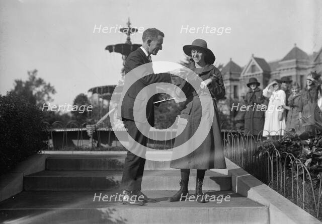 Edwards, Russell T., with Helen Tew, Girl Scout, 1917. Creator: Harris & Ewing.