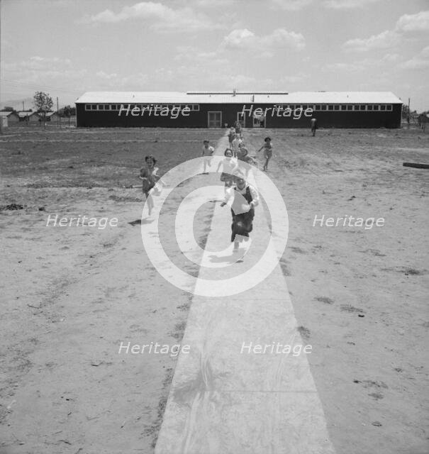 Nursery school children showing community...Farmersville FSA camp, Tulare County, CA, 1939 Creator: Dorothea Lange.