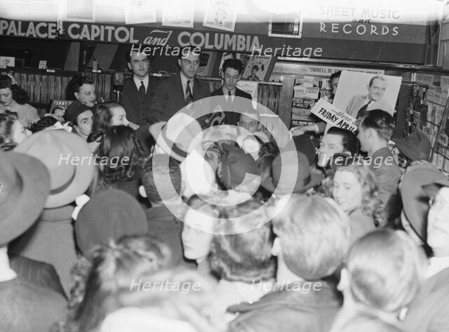 Portrait of Tommy Dorsey, record store, Washington, D.C., 1938. Creator: William Paul Gottlieb.