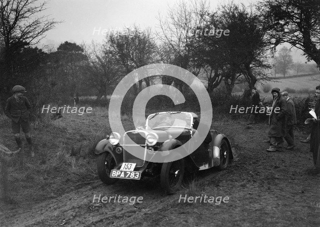 Singer of L Sandford at the Sunbac Colmore Trial, near Winchcombe, Gloucestershire, 1934. Artist: Bill Brunell.