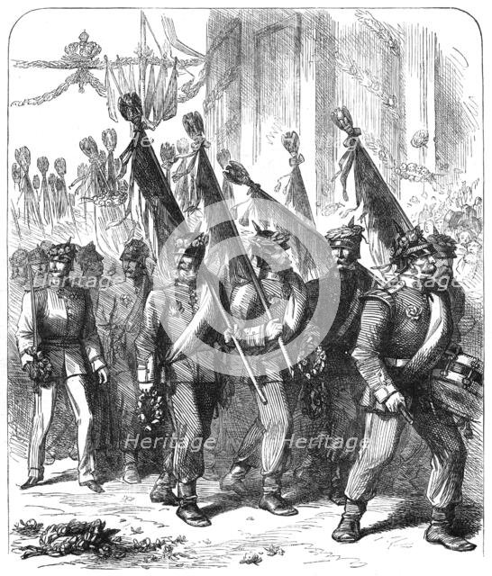 The Military Triumph at Berlin: captured French eagles passing under the Brandenburg Gate, 1871. Creator: Unknown.