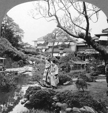 Japanese maids in a garden, 1904.Artist: BL Singley