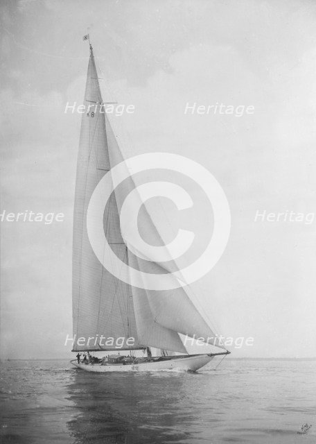 The 23 Metre 'Candida' sailing close-hauled, 1935. Creator: Kirk & Sons of Cowes.