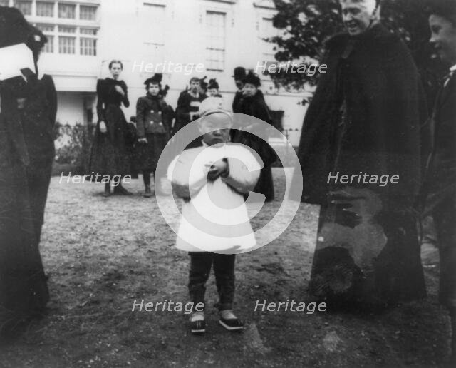 One of the youngest egg rollers on the White House lawn, 1898. Creator: Frances Benjamin Johnston.