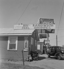 Roadside stand and filling station near Ennis, Texas, 1937. Creator: Dorothea Lange.