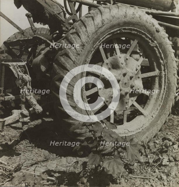 The tractor is driving cotton workers off the land, Aldridge Plantation, Mississippi Delta, 1937. Creator: Dorothea Lange.