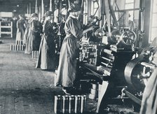 Girl munition workers at their lathes in a Scottish mill, c1914. Artist: Unknown