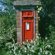 Red post box from Queen Victoria's reign, Cambrose, Cornwall. Artist: Coates