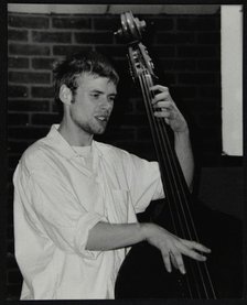 Bassist Ben Haselden playing at The Fairway, Welwyn Garden City, Hertfordshire, 8 April 2001. Artist: Denis Williams