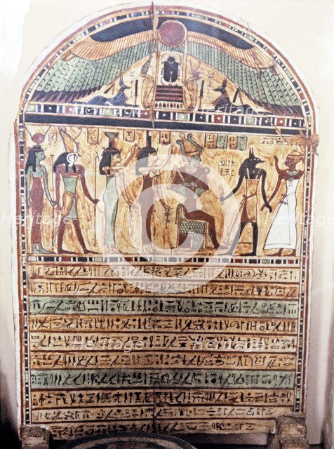 Funerary stela representing the deceased accompanied by Anubis in the presence of Osiris and Horu…