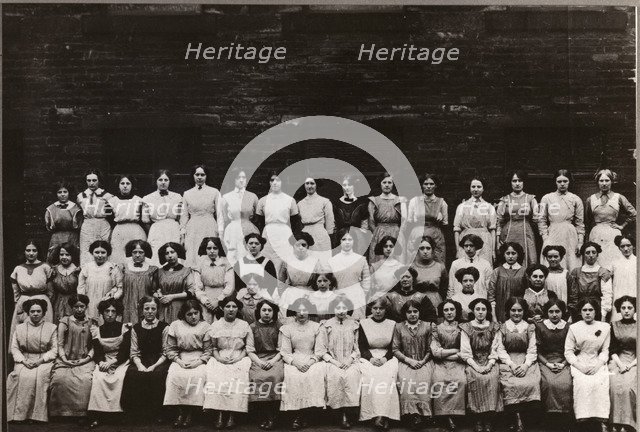 Group photo of women and girl workers at Mackintosh, Halifax, West Yorkshire, 1912. Artist: Unknown
