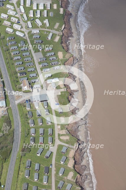 A holiday park threatened by coastal erosion, Withernsea, East Riding of Yorkshire, 2016. Creator: Dave MacLeod.