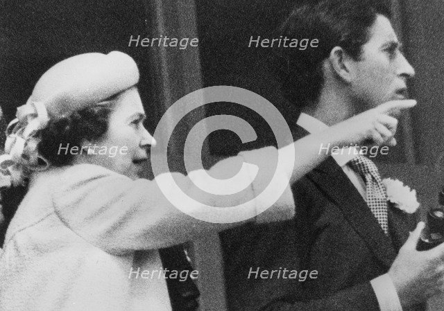 Queen Elizabeth II and Prince Charles in the Royal Box at Epsom, 1979.  Creator: Unknown.