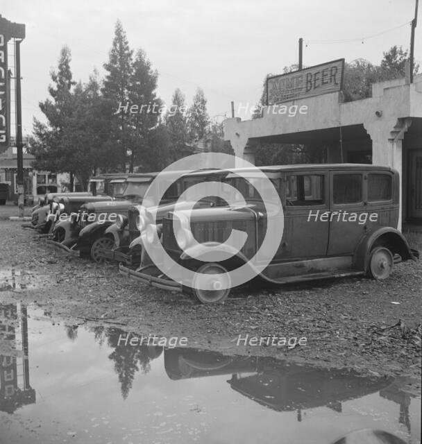 Roadside used car display on State Highway 17, Santa Clara County, California, 1939. Creator: Dorothea Lange.