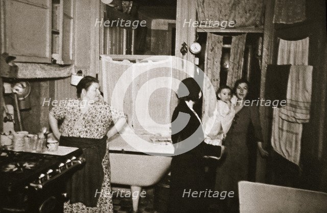 Residents of a tenement, Henry Street, Lower East Side, Manhattan, New York, USA, early 1930s. Artist: Unknown