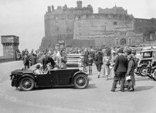 Kitty Brunell and her MG Magna on Castle Esplanade, Edinburgh, RSAC Scottish Rally, 1932. Artist: Bill Brunell.