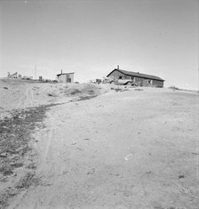 The Browning home, a partial dugout, Dead Ox Flat, Malheur County, Oregon, 1939. Creator: Dorothea Lange.